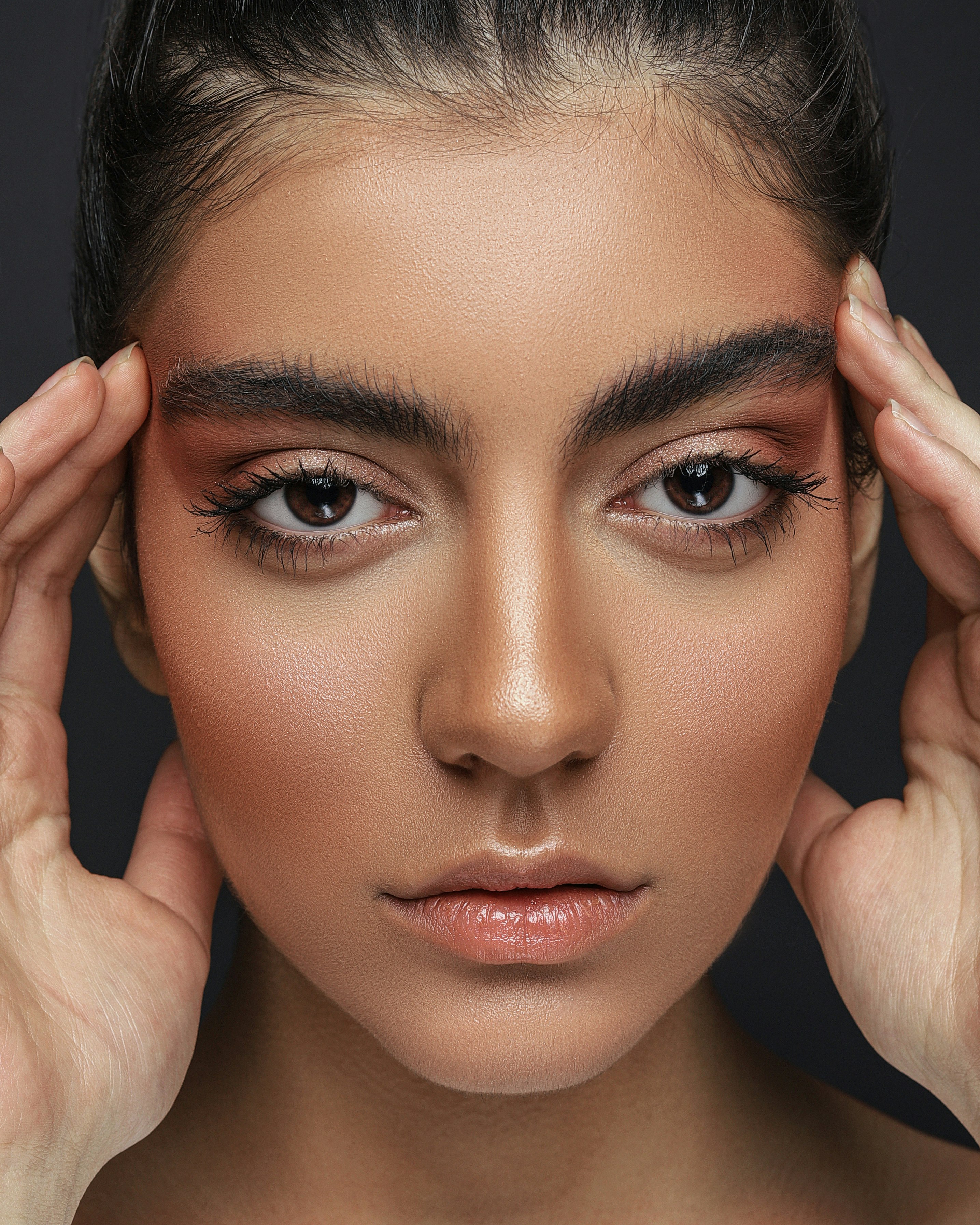 woman with black eyeshadow and black mascara